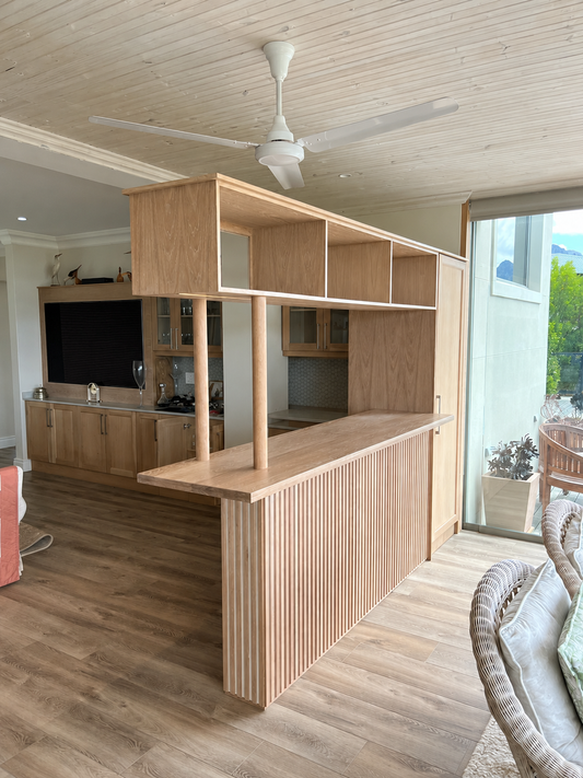 Luxury handcrafted American White Oak home bar with custom shelving and contemporary design by Rooibaard Woodwork
